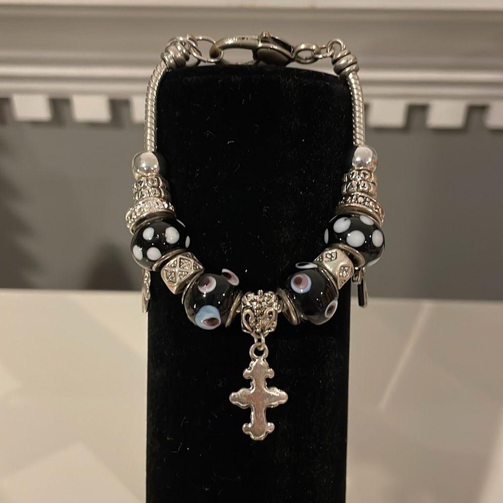 Black and white bead bracelet with silver accents